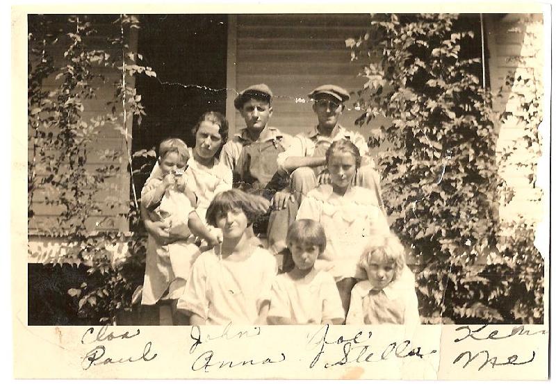 Cloa and Paul  Girotti (child), John and Joe Girotti (top), Stella Evans Girotti (below Joe), Kathryn  and Ann Merlo, and Marguerite Girotti 